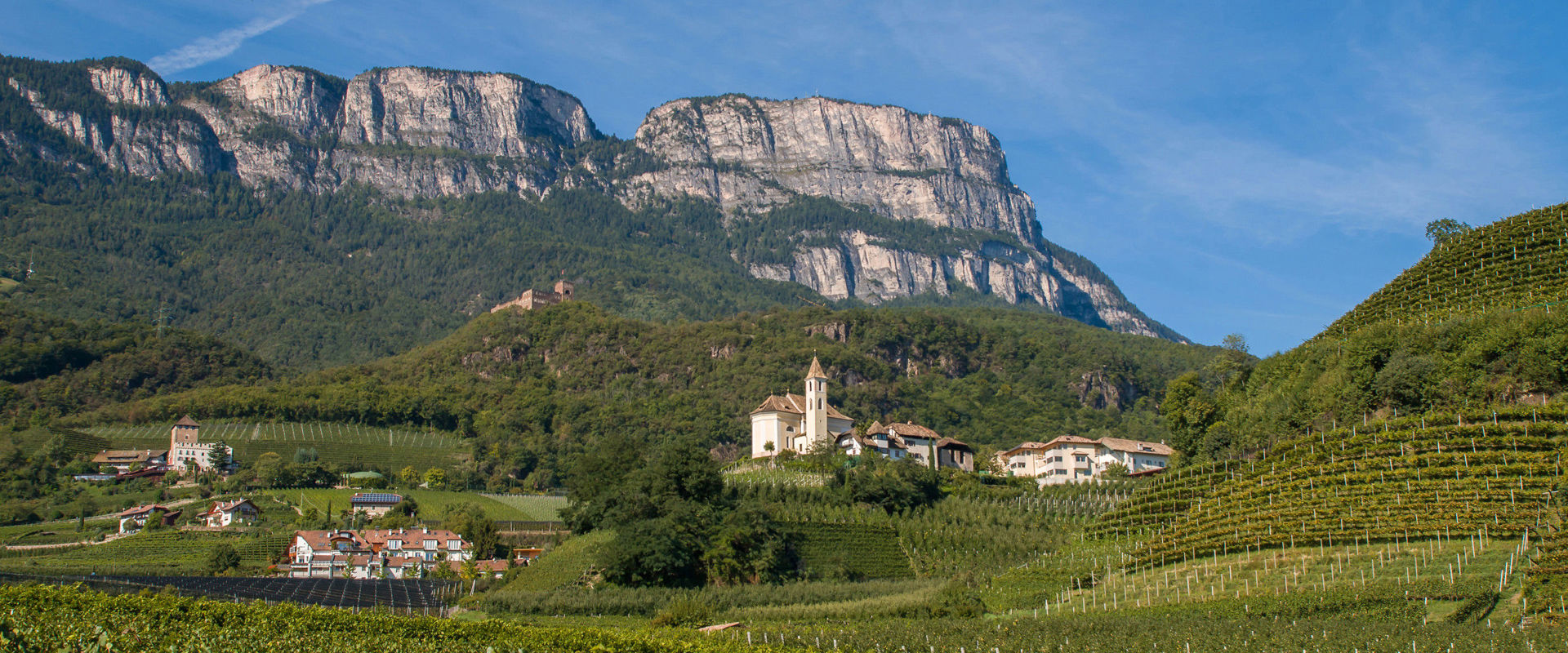 Boymont Castle ruins and Schloss Hotel Korb castle Boymont castle ruins and Schloss Hotel Korb castle nestled in the extensive hilly landscape of Eppan.