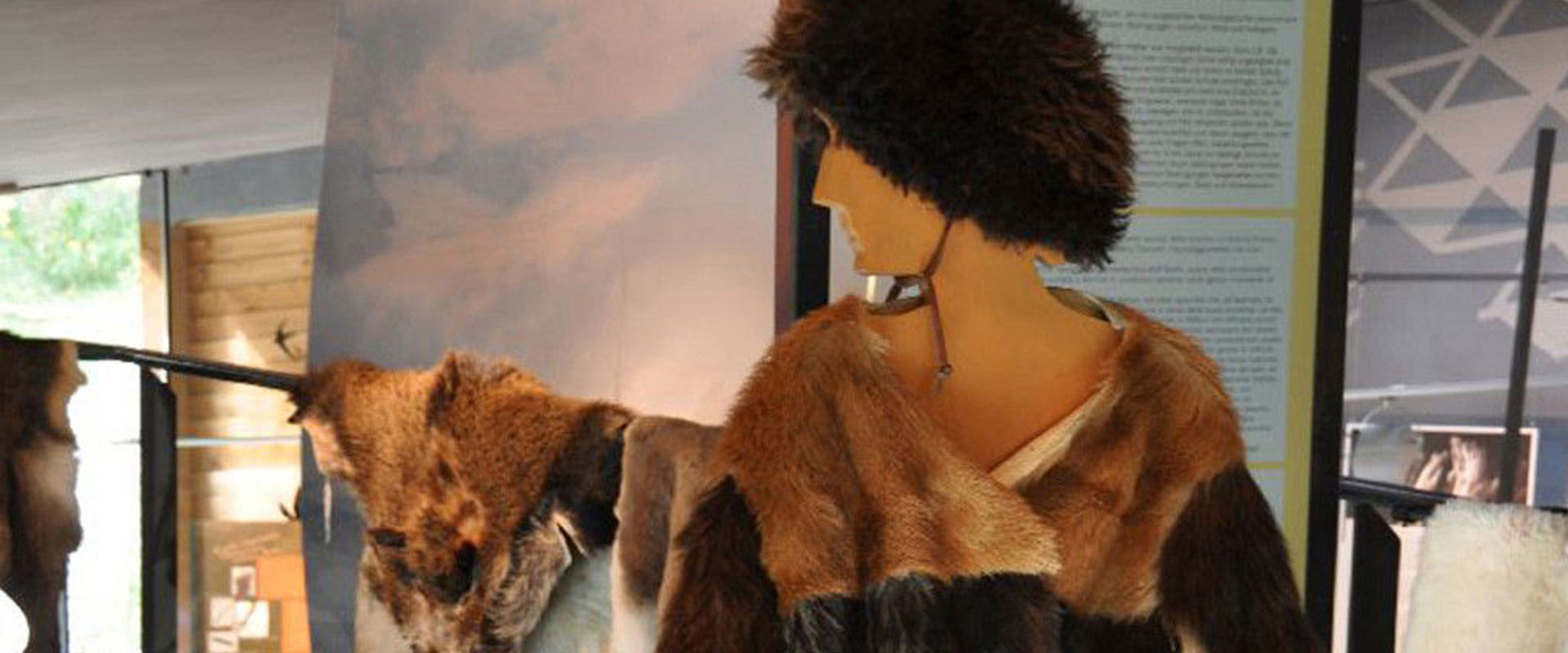 Archeoparc Schnalstal Typical clothing with furs.