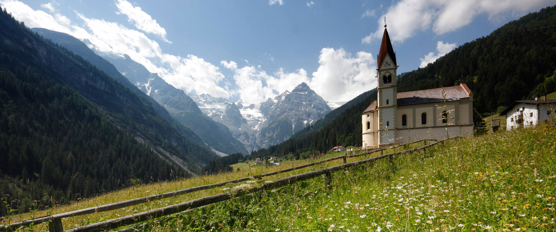 Trafoi The parish church of Trafoi and a flower meadow below.