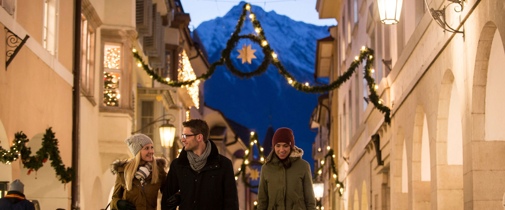 Arcades of Meran's old town centre. The arcades of Meran's old town centre in winter with Christmas decorations.