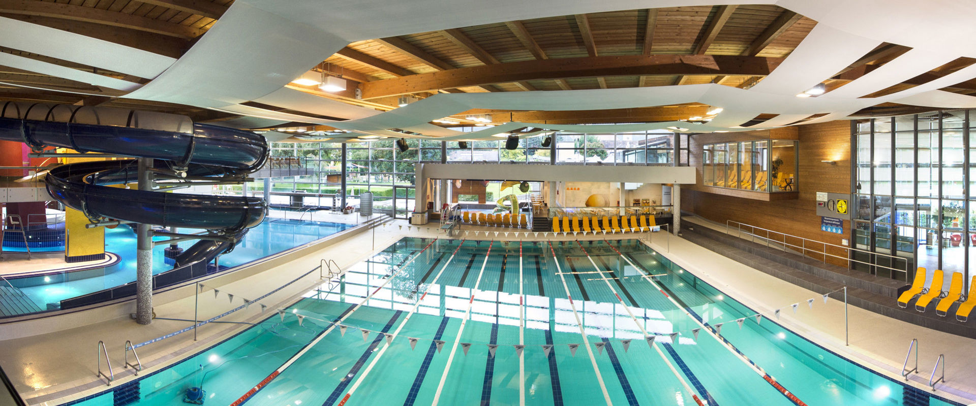 View from the indoor area of the Acquarena Brixen swimming pool.