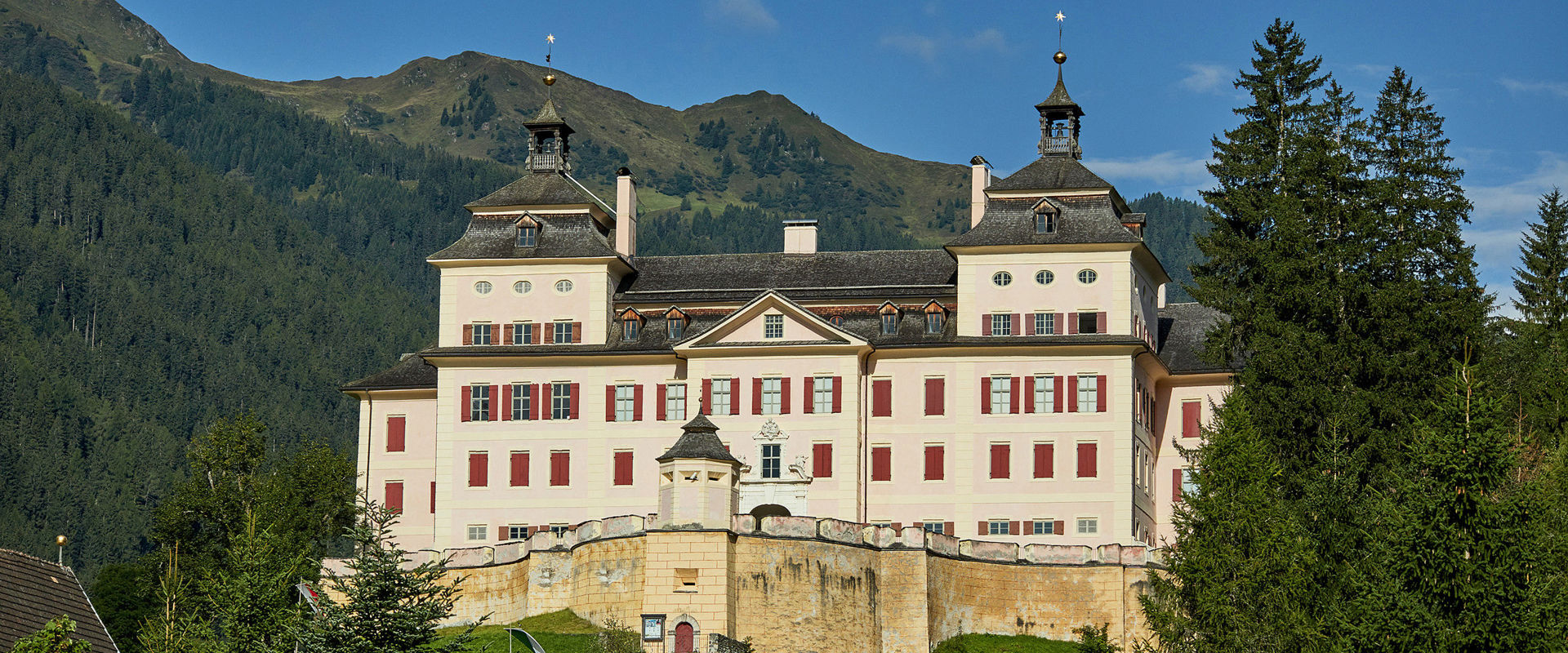 Wolfsthurn Castle  Wolfsthurn Castle sits enthroned on a hill surrounded by stately meadows and trees.
