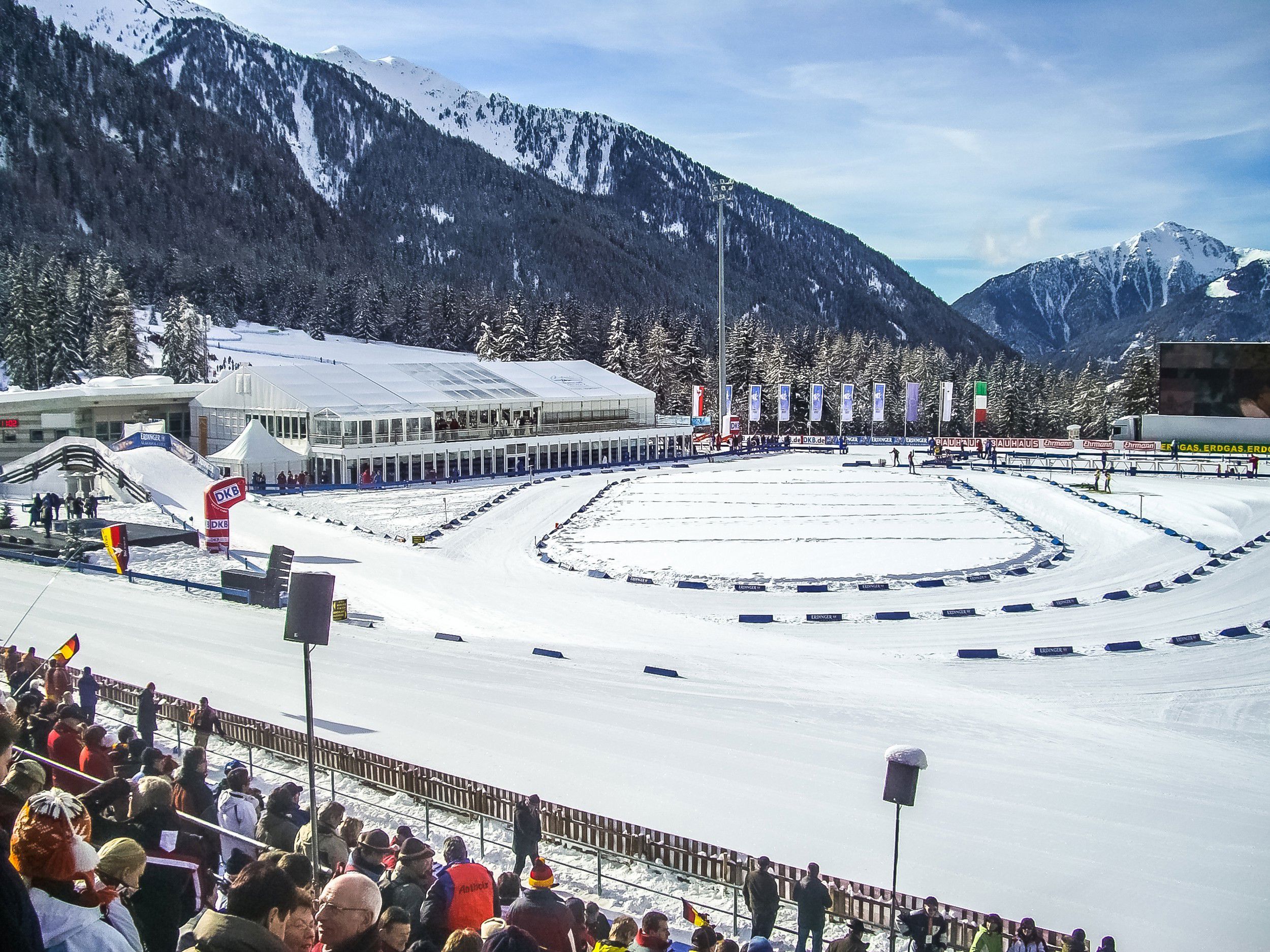 Antholz Biathlon Stadium and spectators in the stands.
