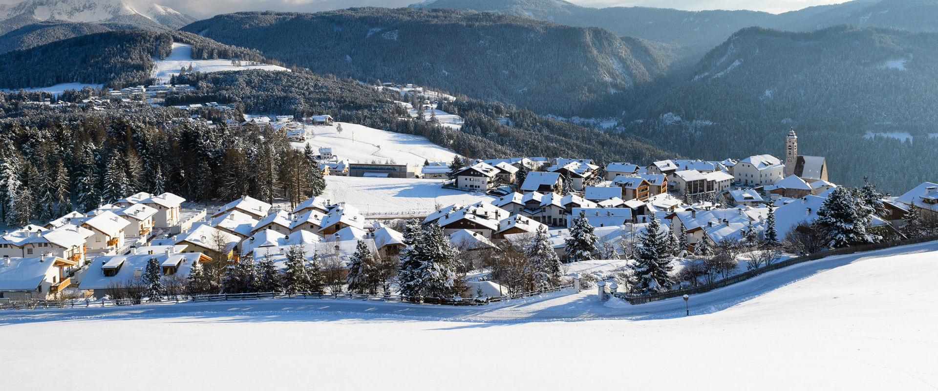 Deutschnofen View of the village centre and the church of Deutschnofen