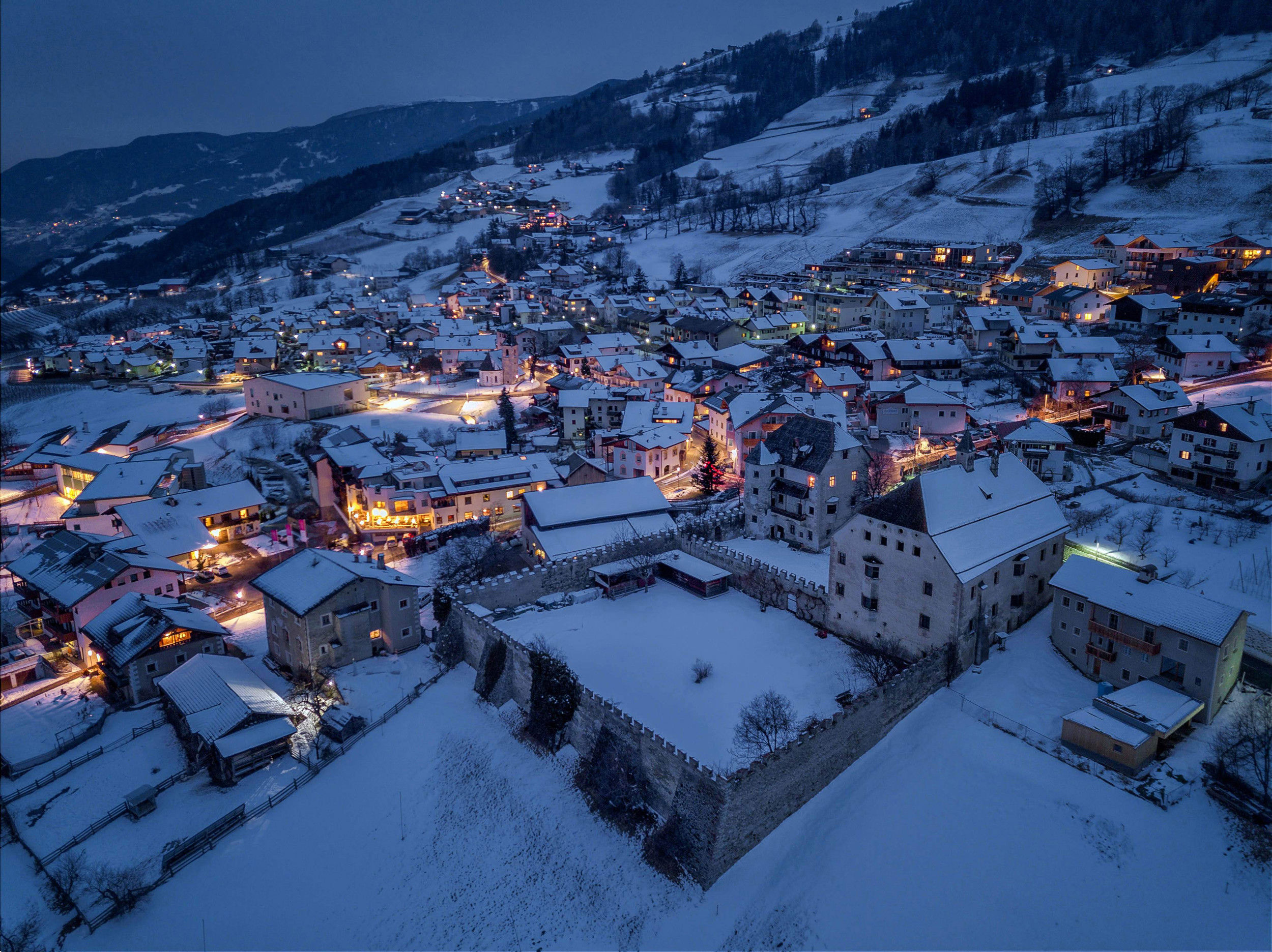 Feldthurns from above in the night & with new snow