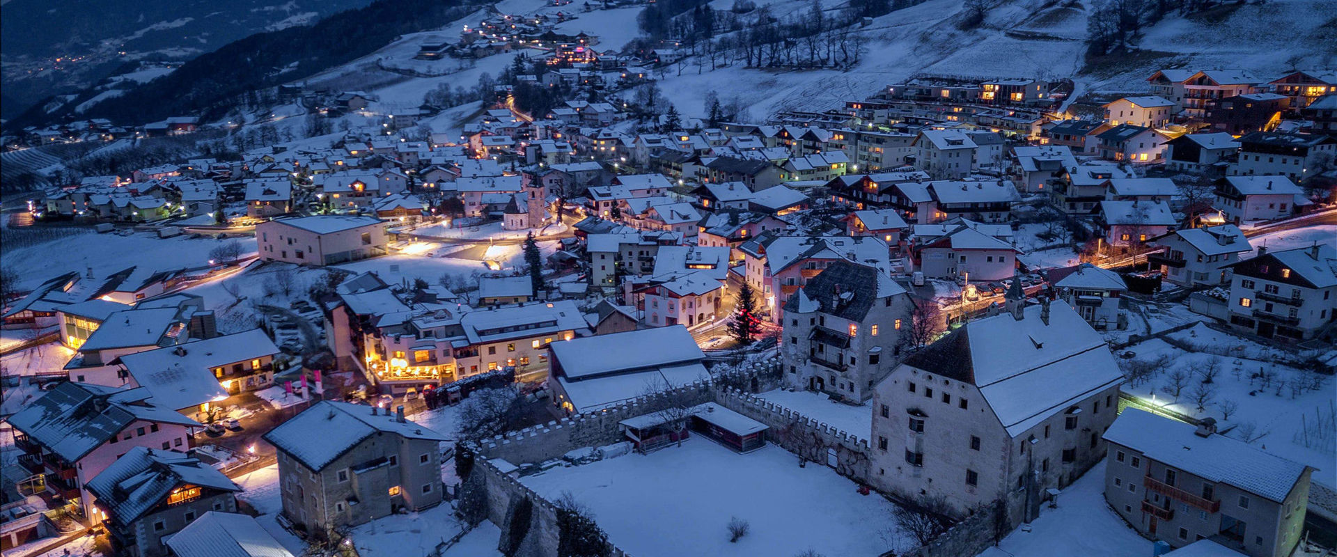 Feldthurns Feldthurns from above in the night & with new snow