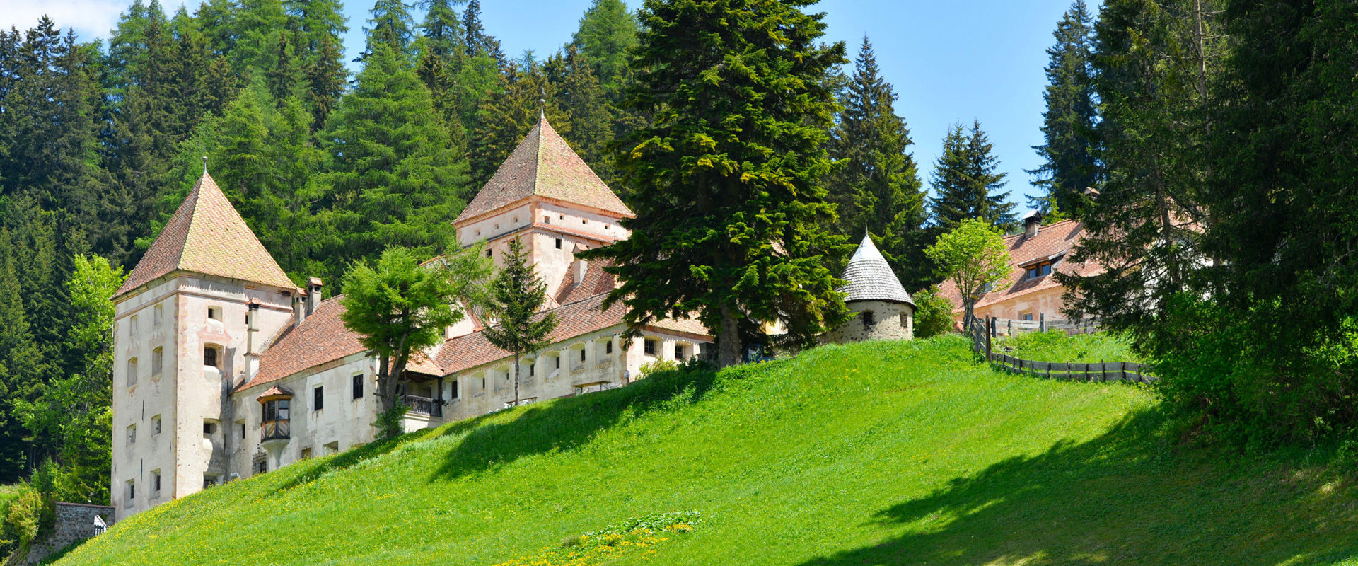 Gardena Castle also called Fish Castle Situated on a green meadow surrounded by tall trees there is the so-called Fish Castle.