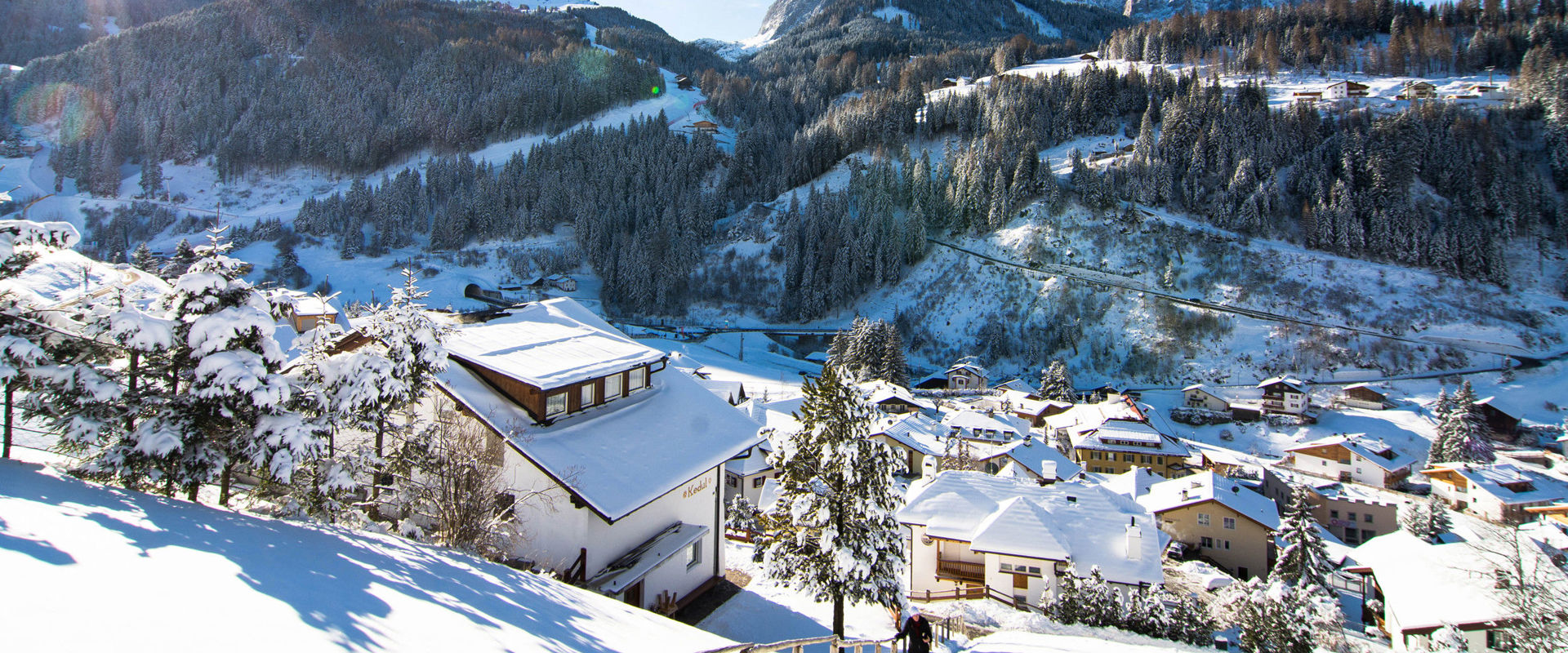 St. Christina in Gröden View of St. Christina in Gröden with snow landscape & Langkofel massif
