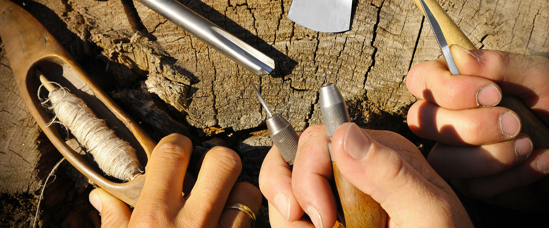 Tools Several hands hold different tools.
