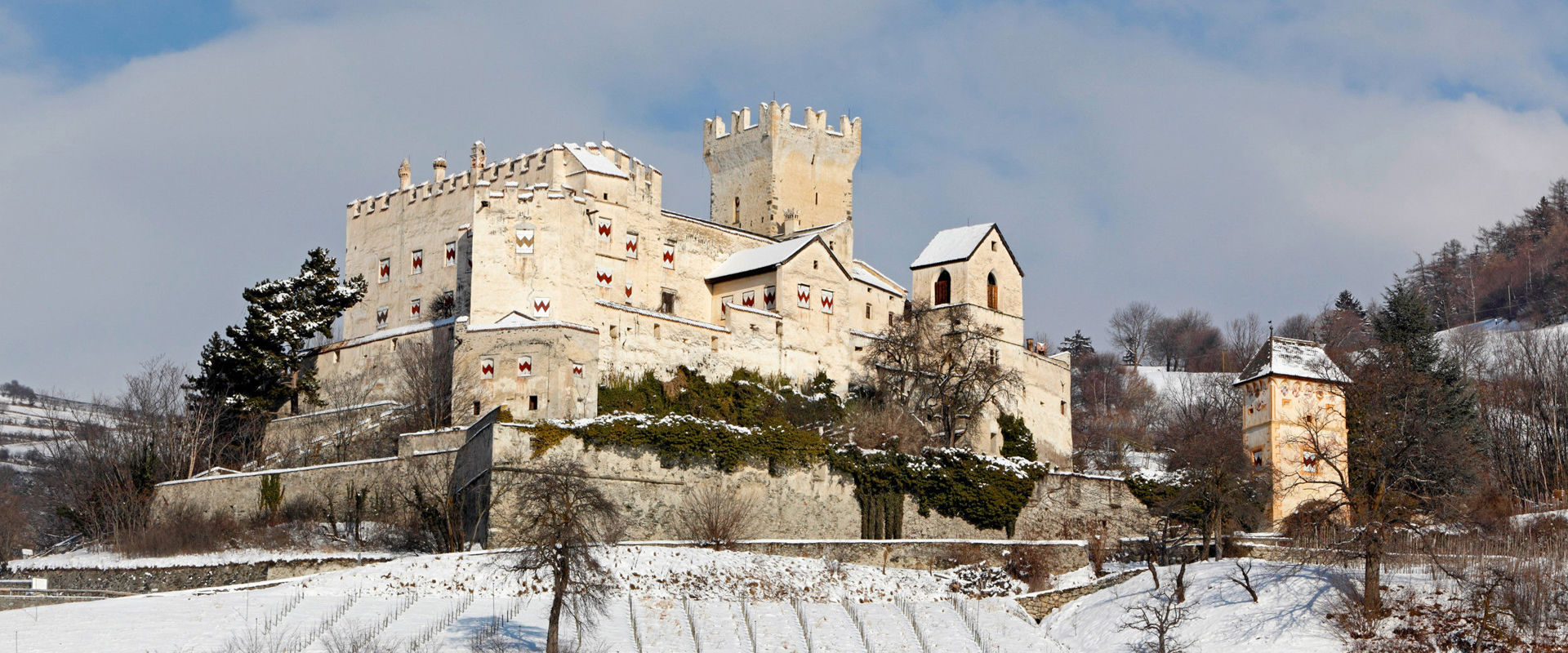 Churburg Castle in winter View of the castle covered with snow.