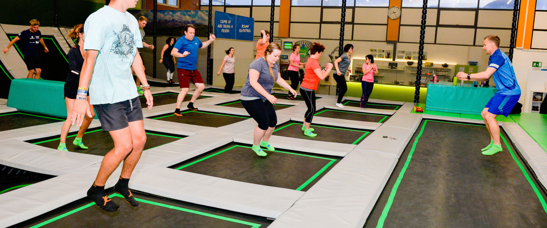 Jumping on a trampoline Group of adults jumping on a trampoline.